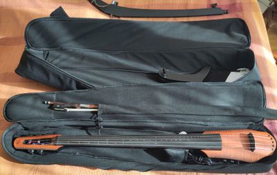 ...the inner bag holds the elelectric cello. It is a NXT5a with a low F string.